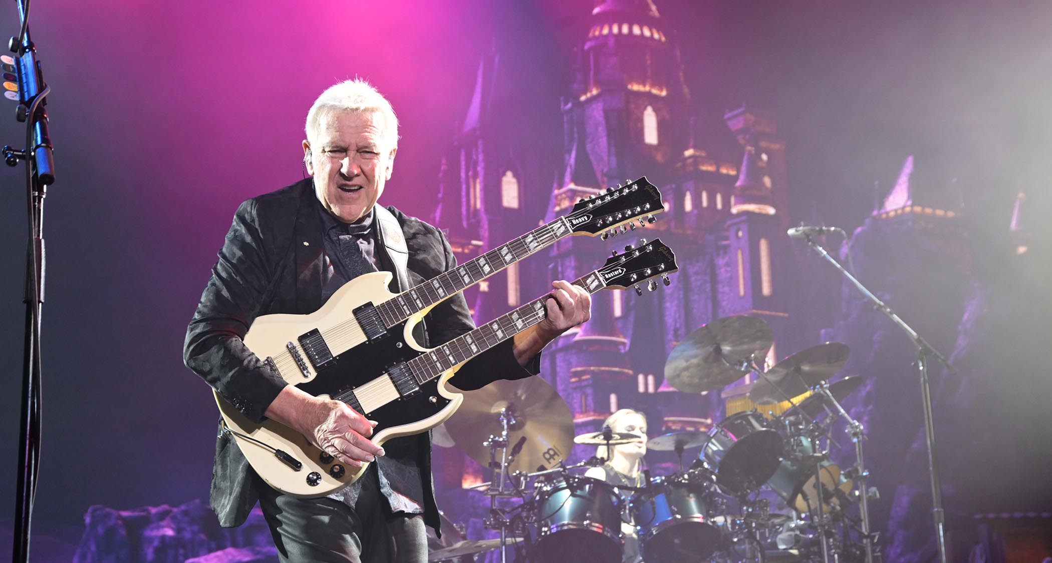 Alex Lifeson performs with a double-neck.