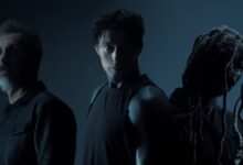 Serj Tankian, Ronnie Radke and Corey Taylor in a dark blue promotional portrait for Falling In Reverse’s Joseph