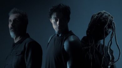 Serj Tankian, Ronnie Radke and Corey Taylor in a dark blue promotional portrait for Falling In Reverse’s Joseph