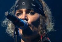 Johnny Depp singing into a microphone with Hollywood Vampires at the Montreux Jazz Festival