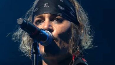 Johnny Depp singing into a microphone with Hollywood Vampires at the Montreux Jazz Festival