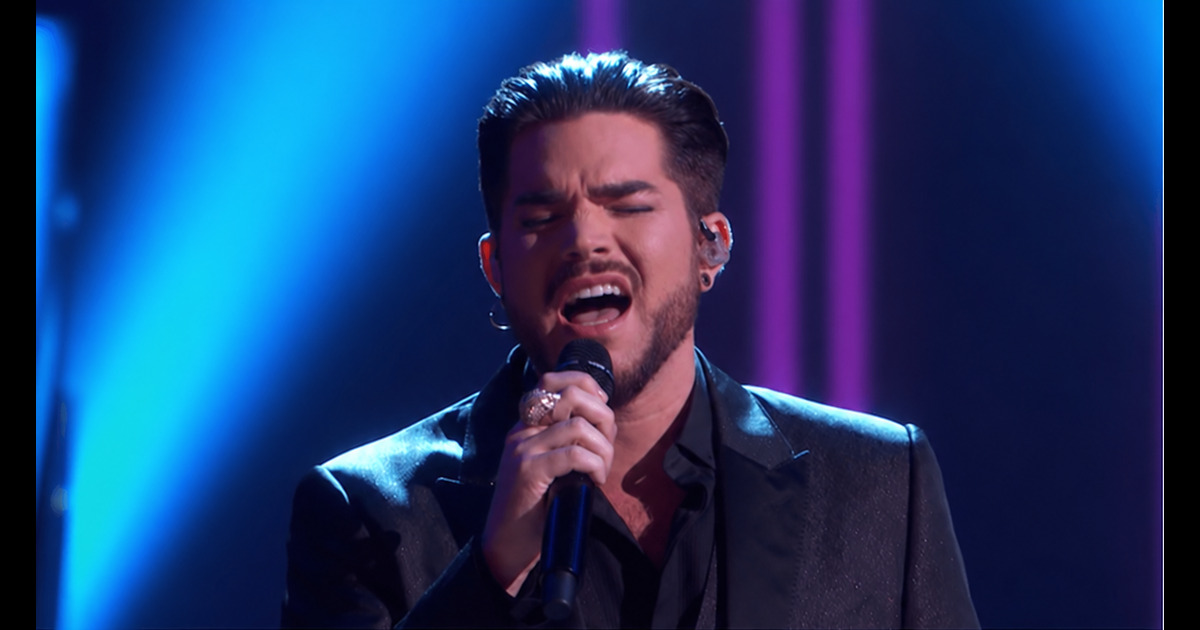Edited illustration of Adam Lambert passionately singing under blue concert lighting.