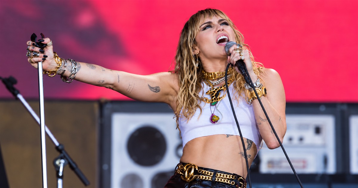 Expression-edited editorial image of Miley Cyrus singing Black Dog