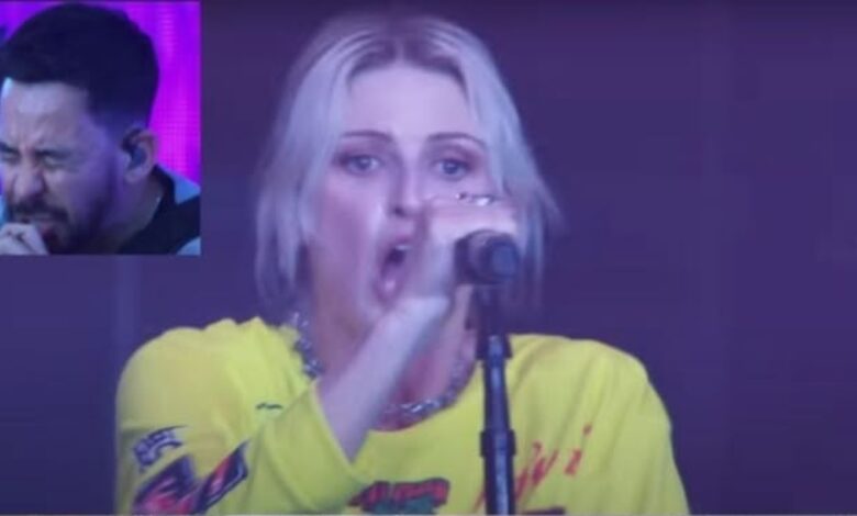 Emily Armstrong in a yellow jersey singing into a microphone; Mike Shinoda appears in an inset.