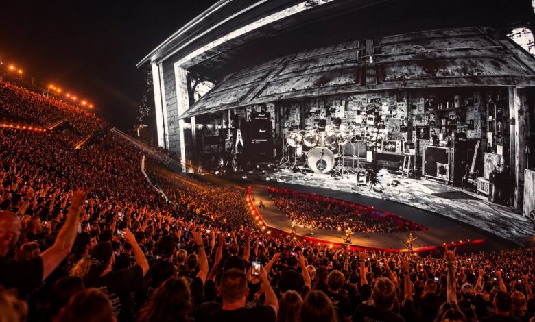 Metallica’s Sphere concert stage and a densely packed audience.