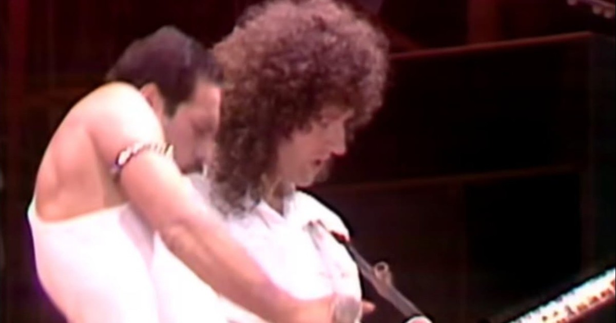 Freddie Mercury beside Brian May during Queen’s Live Aid performance.